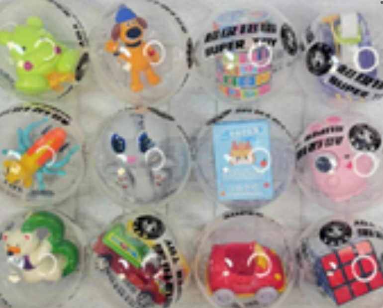 Фігурка-сюрприз у капсулі Economy Clear 100 мм